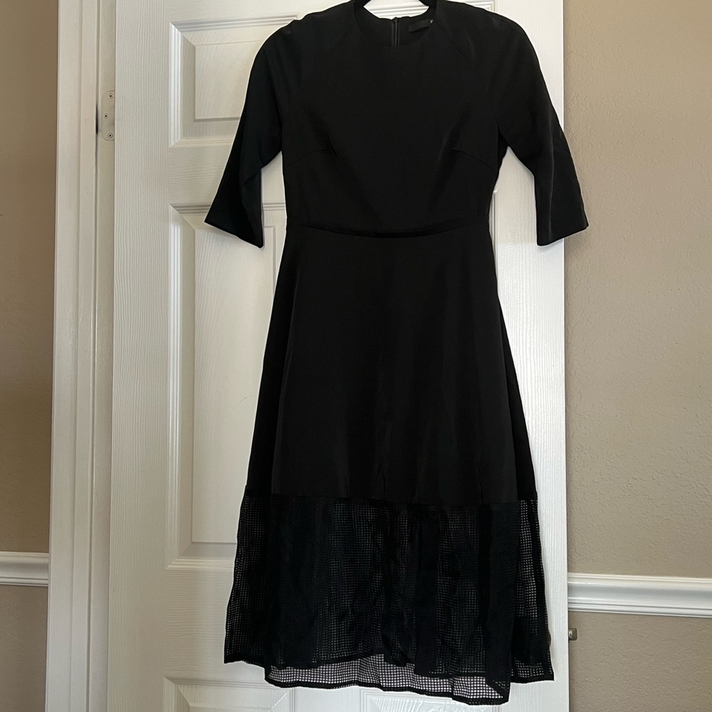 Elegant Black Dress with Mesh Details
